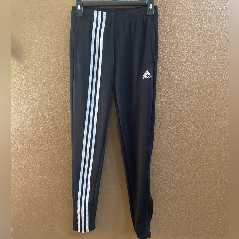 Black Adidas track pants